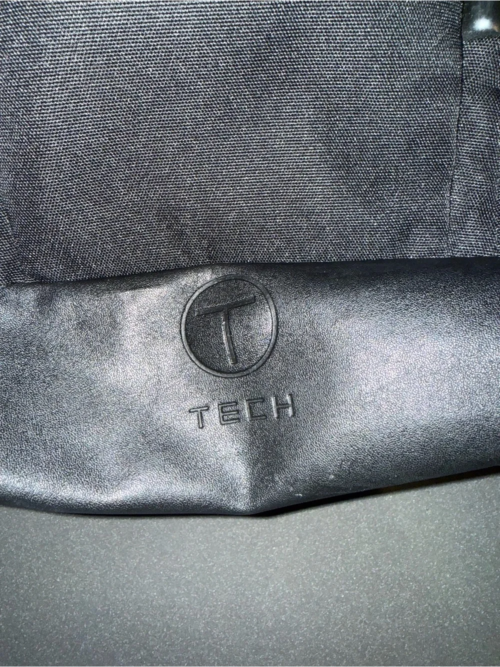 Tumi Black Tech Backpack with Subtle Red Accent
